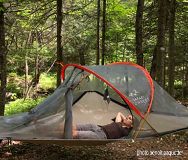 Hammock-tent in a preserved forest in the south of Quebec